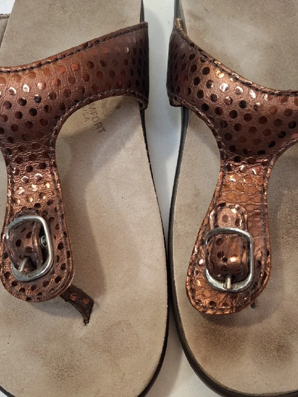 SAS Sanibel Metallic Bronze Gold Thong T Strap Sandals with Gold Buckle Detail.